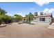 This home has a large backyard with an outdoor kitchen, covered patio, and a fire pit at 2745 E Dahlia Dr, Phoenix, AZ 85032