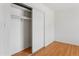 Simple bedroom closet featuring a white sliding door, offering functional storage space at 2745 E Dahlia Dr, Phoenix, AZ 85032