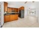Beautiful kitchen featuring wood cabinets, stainless steel appliances and tiled floors at 2745 E Dahlia Dr, Phoenix, AZ 85032