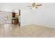 Open living room with tiled floors, neutral paint, and natural light from the patio doors at 2745 E Dahlia Dr, Phoenix, AZ 85032