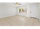 Inviting living room featuring tiled floors, a ceiling fan, and natural light at 2745 E Dahlia Dr, Phoenix, AZ 85032