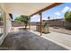 This home features an outdoor kitchen with a built-in stainless steel BBQ grill and covered patio space at 2745 E Dahlia Dr, Phoenix, AZ 85032