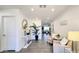 Inviting entryway with neutral paint, tiled floors, and decorative furnishings at 3128 E Desert Cove Ave, Phoenix, AZ 85028
