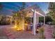 Relaxing backyard with covered pergola, comfortable seating, and desert-friendly plants at 3550 E Edna Ave, Phoenix, AZ 85032