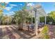 Private backyard space with pergola, seating, desert landscaping, and a tranquil retreat at 3550 E Edna Ave, Phoenix, AZ 85032