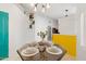 Bright dining room with custom paint, ample natural light, and seating for four at 3550 E Edna Ave, Phoenix, AZ 85032
