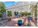 Covered patio with seating area, fire pit, and brick flooring at 3550 E Edna Ave, Phoenix, AZ 85032