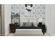 Stylishly decorated bedroom with dinosaur themed art, plush bed, and window with curtain at 3703 E Gold Mountain Ave, San Tan Valley, AZ 85143