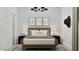 Stylish bedroom features unique cactus-themed wallpaper, a cozy bed, and Western art décor at 3703 E Gold Mountain Ave, San Tan Valley, AZ 85143