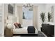 Cozy bedroom with a plush bed, stylish decor, and a large window for natural light at 3703 E Gold Mountain Ave, San Tan Valley, AZ 85143