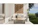 Cozy outdoor seating area featuring a stylish sofa, decorative accents, and tranquil views at 3703 E Gold Mountain Ave, San Tan Valley, AZ 85143