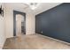 This spacious bedroom boasts an arched entrance to the bathroom at 42424 N Gavilan Peak Pkwy # 57104, Anthem, AZ 85086