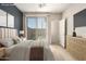 This bedroom features stylish furniture and a calming color scheme at 42424 N Gavilan Peak Pkwy # 57104, Anthem, AZ 85086