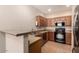 Well-equipped kitchen with stainless steel appliances and laminate countertop at 42424 N Gavilan Peak Pkwy # 57104, Anthem, AZ 85086