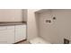 Laundry room with counter space, cabinets, and access for laundry hookups at 42424 N Gavilan Peak Pkwy # 57104, Anthem, AZ 85086