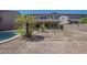 The spacious backyard features a covered patio and is ready for your personal touch at 44538 W Canyon Creek Dr, Maricopa, AZ 85139