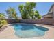 This refreshing backyard pool invites you to relax and enjoy the sunny days and cool waters at 44538 W Canyon Creek Dr, Maricopa, AZ 85139