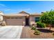 Charming single-story home with a well-maintained front yard and two car garage at 45424 W Norris Rd, Maricopa, AZ 85139