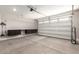 Spacious two-car garage features built-in storage cabinets at 45424 W Norris Rd, Maricopa, AZ 85139