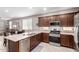 Modern kitchen featuring stainless steel appliances and an open layout at 45424 W Norris Rd, Maricopa, AZ 85139