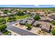 Charming home featuring a tile roof, desert landscaping, and a three-car garage, set in a well-maintained neighborhood at 5529 E Holmes Ave, Mesa, AZ 85206