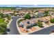 Charming home featuring a tile roof, desert landscaping, and a three-car garage, set in a well-maintained neighborhood at 5529 E Holmes Ave, Mesa, AZ 85206
