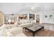 Open concept living room with tile floors, neutral walls, and access to other rooms at 5529 E Holmes Ave, Mesa, AZ 85206