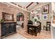 Formal dining area with decorative brick archway to pantry at 5613 E Calle Del Paisano --, Phoenix, AZ 85018