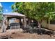 Beautiful backyard with hot tub, gazebo, mature trees, and patio perfect for outdoor living at 6205 W Encinas Ln, Phoenix, AZ 85043