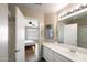 Well-lit bathroom with vanity and shower visible from doorway at 6610 E University Dr # 163, Mesa, AZ 85205
