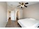 Bedroom with ceiling fan and an en suite bathroom at 6610 E University Dr # 163, Mesa, AZ 85205