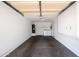 Open garage with laundry machines and water heater, offering practical utility space at 6610 E University Dr # 163, Mesa, AZ 85205