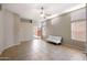 Spacious living room with natural light, tile flooring, and a neutral color palette at 6610 E University Dr # 163, Mesa, AZ 85205