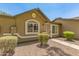 Quaint single-story home with desert landscaping and a welcoming, covered entrance at 6711 W Osborn Rd # 82, Phoenix, AZ 85033