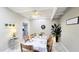 Dining room with elegant table setting, beamed ceilings, and natural light at 6722 E Jean Dr, Scottsdale, AZ 85254