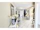 Inviting entryway with neutral walls, tiled floors, and a decorated console table at 6722 E Jean Dr, Scottsdale, AZ 85254