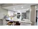 Updated kitchen featuring granite countertops, white cabinets, and stainless steel appliances at 6722 E Jean Dr, Scottsdale, AZ 85254