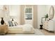 Serene bedroom bathed in natural light, complete with decorative accents and modern furnishings at 7848 W Tether Trl, Peoria, AZ 85383