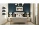 Stylish bedroom showcasing a textured accent wall, modern lighting, and comfortable bedding at 7848 W Tether Trl, Peoria, AZ 85383