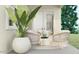 Cozy patio furnished with comfortable seating, ideal for relaxing in a serene outdoor setting at 7848 W Tether Trl, Peoria, AZ 85383