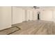Spacious living room with tile floors, neutral walls, and an open floor plan at 857 E Impreria St, San Tan Valley, AZ 85140