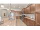 Well-equipped kitchen with granite countertops, stainless steel appliances, and tile backsplash at 9037 E Indigo St, Mesa, AZ 85207