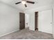Bedroom with carpet and open closet at 11020 N 154Th Ln, Surprise, AZ 85379
