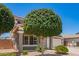 Charming two-story home with well-maintained landscaping and a two-car garage at 11020 N 154Th Ln, Surprise, AZ 85379