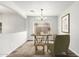 Staged office with wood floors, light walls, and a comfortable chair at 11020 N 154Th Ln, Surprise, AZ 85379