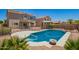 Inviting pool, gazebo, and backyard surrounded by a safety fence and lush greenery at 11020 N 154Th Ln, Surprise, AZ 85379
