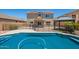 The backyard features a pool, outdoor gazebo and a safety fence at 11020 N 154Th Ln, Surprise, AZ 85379