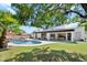 Expansive backyard featuring a pool, outdoor seating, and lush landscaping, ideal for outdoor relaxation and recreation at 12835 N 78Th St, Scottsdale, AZ 85260