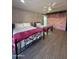 Comfortable bedroom featuring two beds with black iron frames, and a decorative wall with flowers at 12835 N 78Th St, Scottsdale, AZ 85260