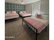 Inviting bedroom featuring three beds, tile floors, and ample natural light at 12835 N 78Th St, Scottsdale, AZ 85260